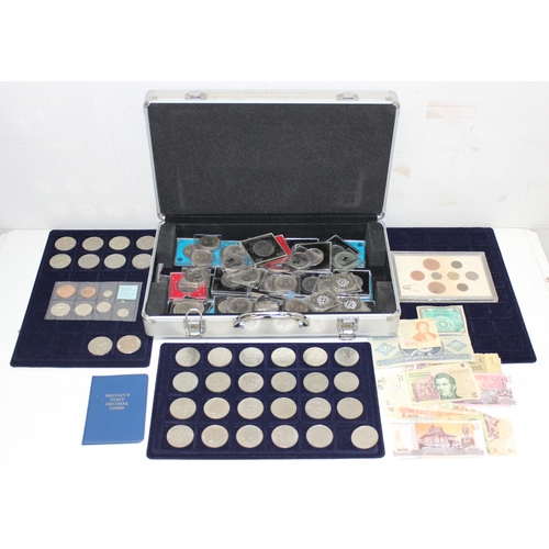 1215 - Aluminium coin collectors' case and contents, mainly commemorative crowns, 2 £5 coins, qty of bankno... 