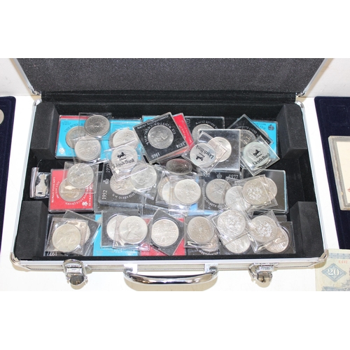 1215 - Aluminium coin collectors' case and contents, mainly commemorative crowns, 2 £5 coins, qty of bankno... 