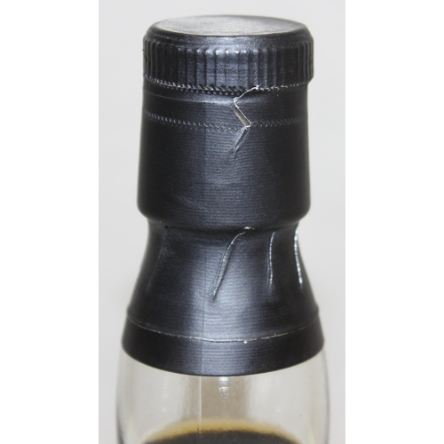 1461 - 70cl bottle of Cú Dhub (Black Dog) Single Malt Whisky