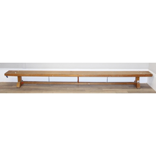 53 - A long vintage low wooden school gymnastics bench, approx 336cm long