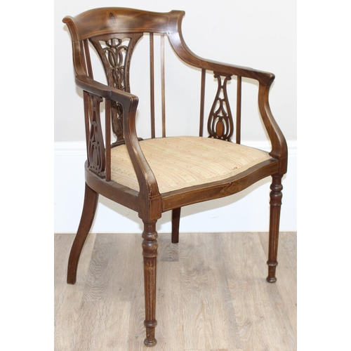 72 - An Edwardian mahogany tub chair with pierced fretwork back, inlaid details and reeded legs, approx 5... 