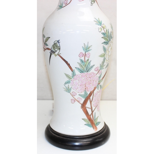 268A - large Oriental converted table lamp on wooden base with floral decoration, approx 50cm tall