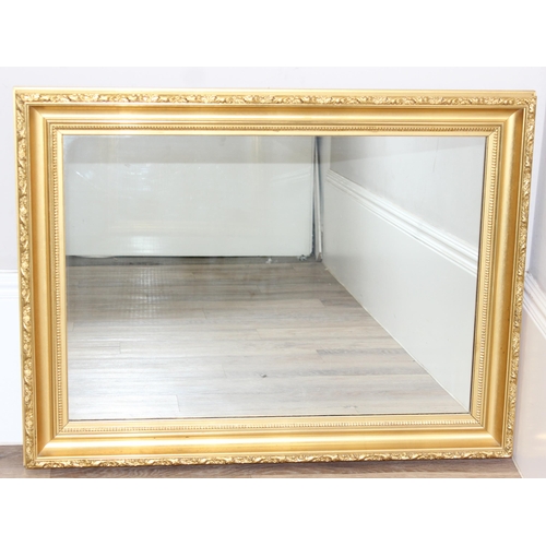 428 - Antique style gilt framed wall mirror, approx size 97cm x 73cm