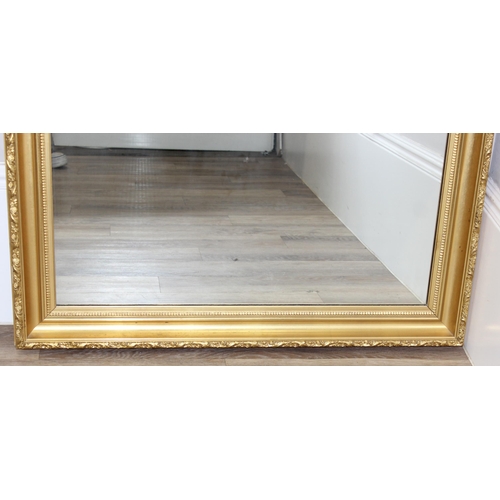 428 - Antique style gilt framed wall mirror, approx size 97cm x 73cm