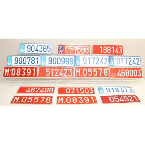 749 - Qty of vintage pressed aluminium car number plates to British and European examples, largest approx ... 