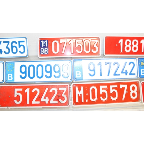 749 - Qty of vintage pressed aluminium car number plates to British and European examples, largest approx ... 