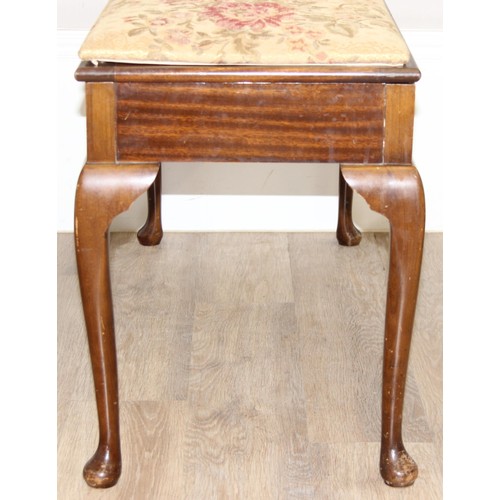 135 - A vintage floral topped piano stool with lift up seat, approx 94cm wide x 38cm deep x 53cm tall