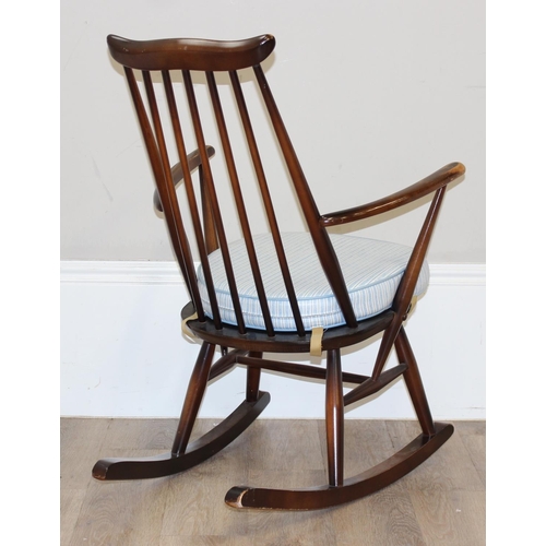 129 - Retro Ercol Goldsmith rocking chair with cushion, approx 61cm wide x 86cm tall