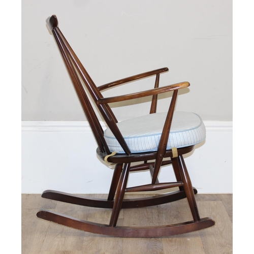 129 - Retro Ercol Goldsmith rocking chair with cushion, approx 61cm wide x 86cm tall