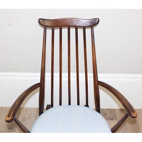 129 - Retro Ercol Goldsmith rocking chair with cushion, approx 61cm wide x 86cm tall