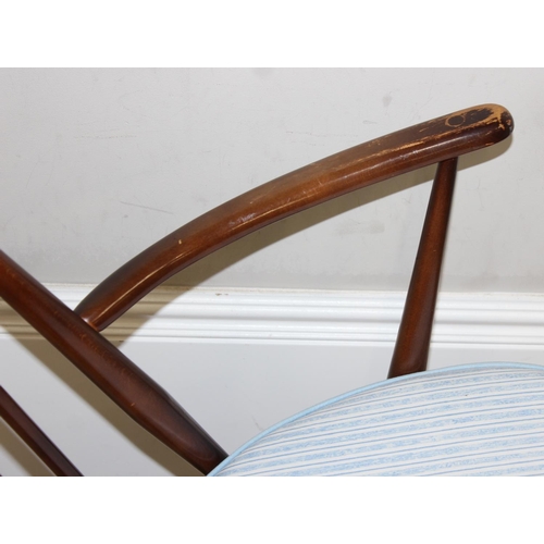 129 - Retro Ercol Goldsmith rocking chair with cushion, approx 61cm wide x 86cm tall