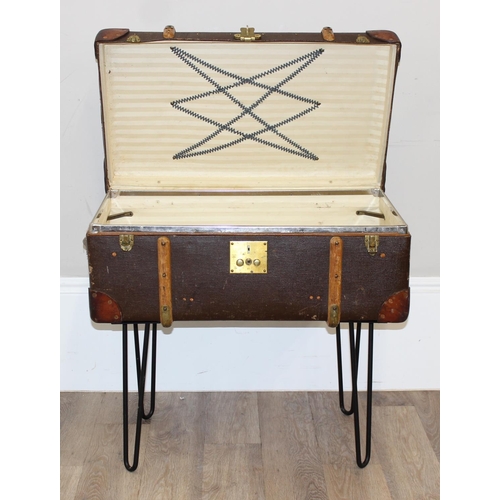 147 - A vintage canvas suitcase or shipping trunk coffee table on metal hairpin legs, approx 77cm wide x 4... 