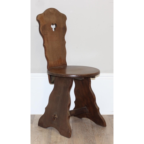 70 - A vintage mahogany hall chair with trefoil cut out to back and a round seat, approx 89cm tall