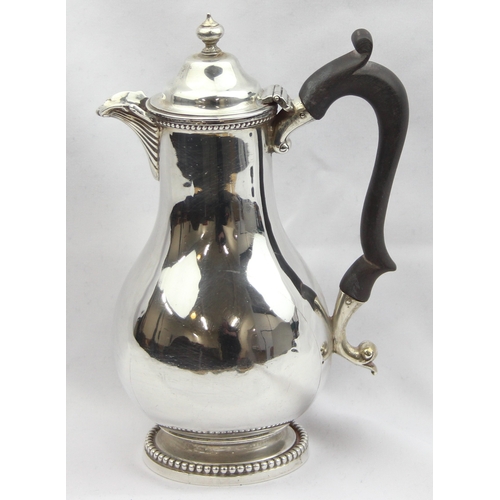 1086 - A Georgian style silver coffee pot of bulbous form, London 1911 by G Brace & Co Ltd, approx 19cm tal... 