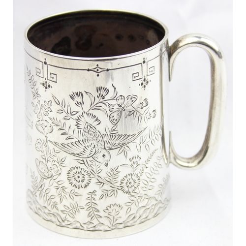 1005 - A Victorian silver christening mug with engraved decoration of birds, butterflies and flora, marked ... 