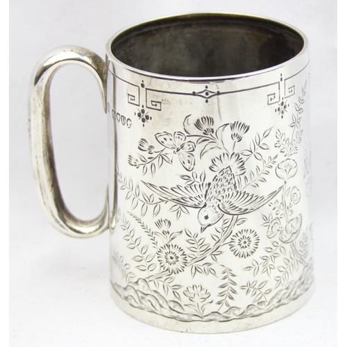 1005 - A Victorian silver christening mug with engraved decoration of birds, butterflies and flora, marked ... 