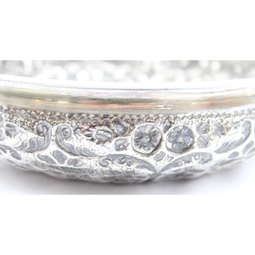 1009A - An impressive embossed Indian or middle eastern silver bowl with raised domed centre, decorated with... 