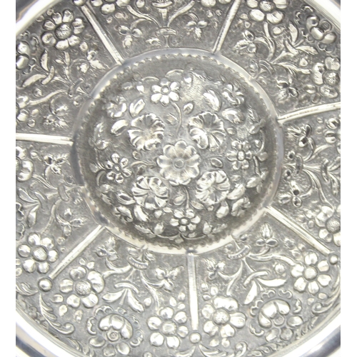 1009A - An impressive embossed Indian or middle eastern silver bowl with raised domed centre, decorated with... 