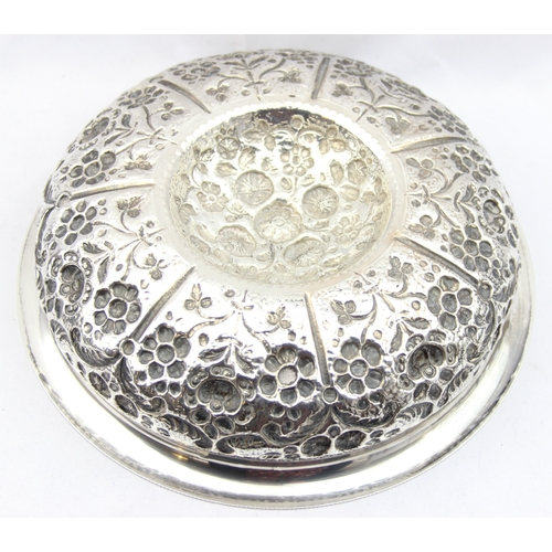 1009A - An impressive embossed Indian or middle eastern silver bowl with raised domed centre, decorated with... 