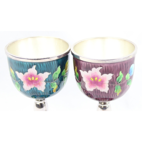 1011 - A pair of Korean .999 pure silver and cloisonne enamel goblets, presented in boxes, seemingly unmark... 