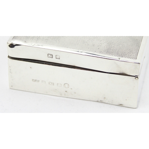 1012 - An Art Deco period silver and wooden lined cigarette box with engine turned top, Birmingham 1935 by ... 