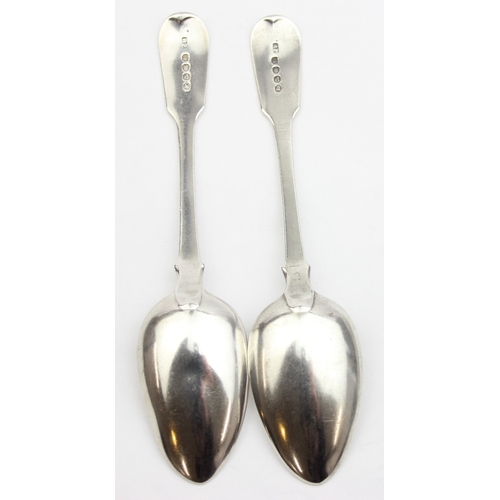 1048 - A pair of Georgian silver dessert spoons, London 1819 by Richard Poulden, approx 17cm wide, approx 8... 