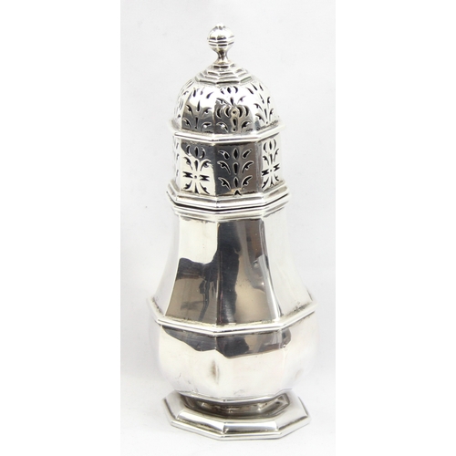 1055 - An impressive silver sugar castor of Georgian form, octagonal shape, marked for Sheffield 1907 by Th... 