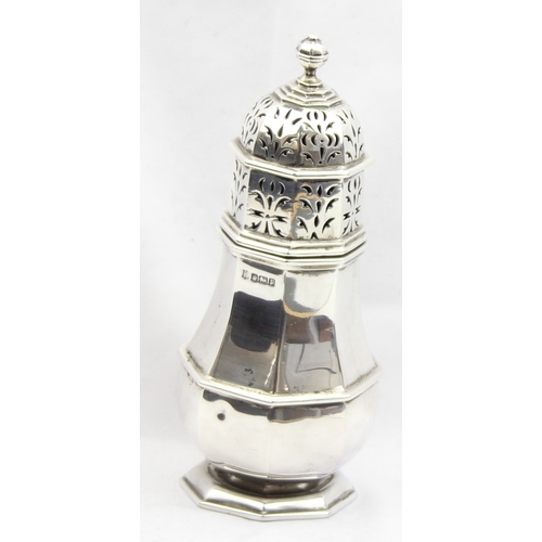 1055 - An impressive silver sugar castor of Georgian form, octagonal shape, marked for Sheffield 1907 by Th... 