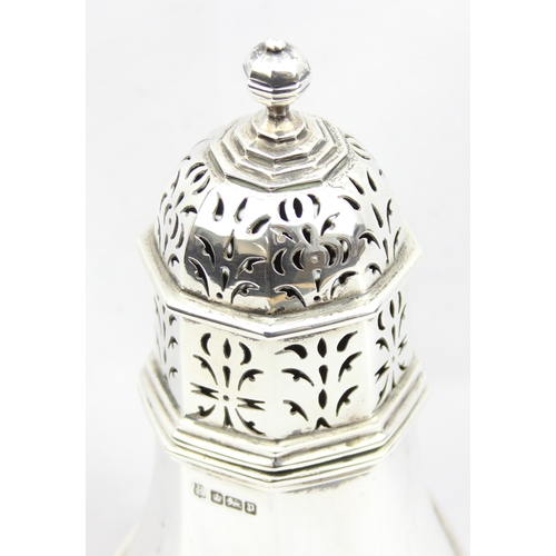 1055 - An impressive silver sugar castor of Georgian form, octagonal shape, marked for Sheffield 1907 by Th... 