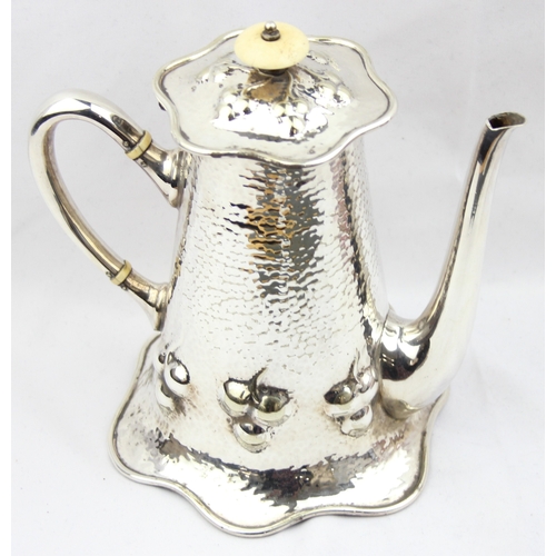 1056 - An impressive Mappin & Webb silver plate coffee pot in the Art Nouveau manner with hammered finish, ... 