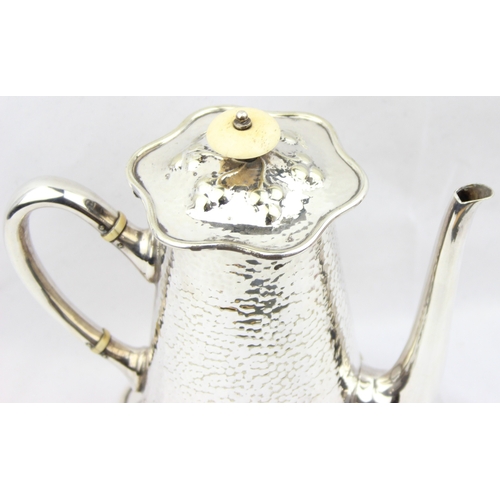 1056 - An impressive Mappin & Webb silver plate coffee pot in the Art Nouveau manner with hammered finish, ... 