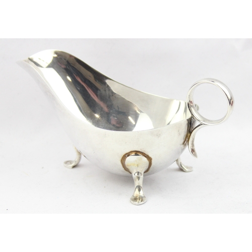 1057 - A plain silver sauce boat, Sheffield 1943 by James Dixon & Sons, approx 16cm wide, approx 154.73g gr... 