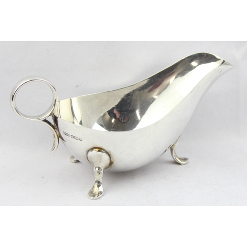 1057 - A plain silver sauce boat, Sheffield 1943 by James Dixon & Sons, approx 16cm wide, approx 154.73g gr... 