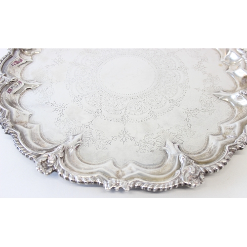 1069 - A large and very impressive early 20th century silver tray with engraved decoration, marked for Shef... 