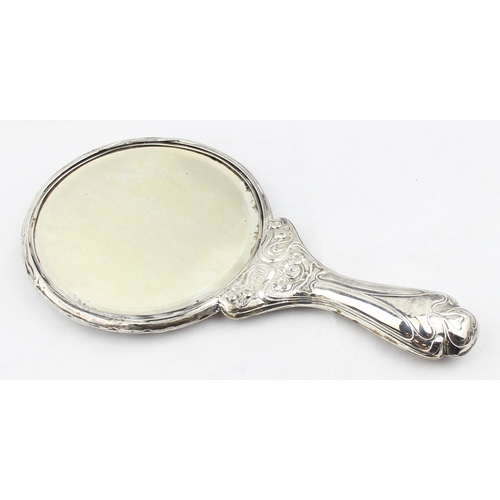 1072 - A silver mounted Art Nouveau designed hand mirror, depicting a female figure playing a harp, marked ... 