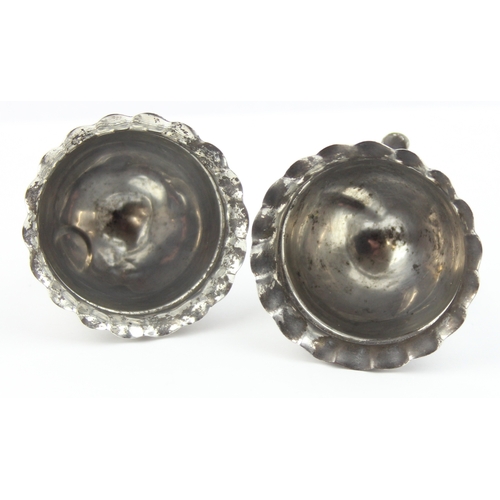 1075 - A pair of silver salts with ruffled rims and pad feet, marked for Sheffield 1897 by Joseph Rodgers, ... 