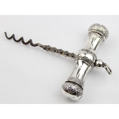 1083 - An antique silver handled corkscrew, the handle marked for Birmingham 1895 by Edward Souter Barnsley... 