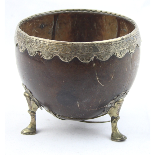 1000 - An 18th century silver mounted coconut cup, the coconut with plain body and mounted with a silver ri... 