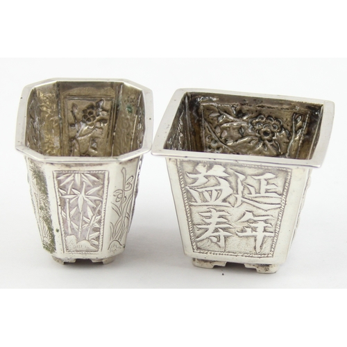 1091 - 2 Chinese silver salts with embossed decoration, one marked for Cum Wo of Hong Kong, the other unmar... 