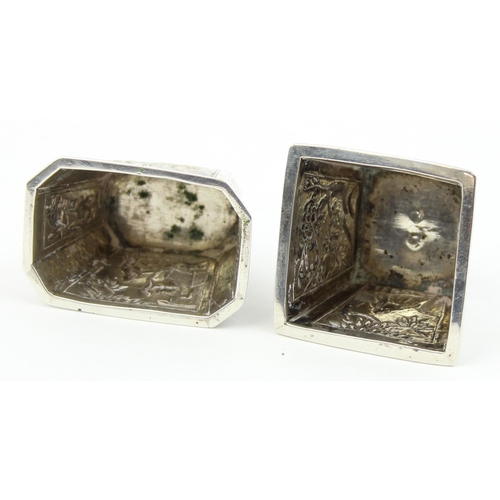 1091 - 2 Chinese silver salts with embossed decoration, one marked for Cum Wo of Hong Kong, the other unmar... 