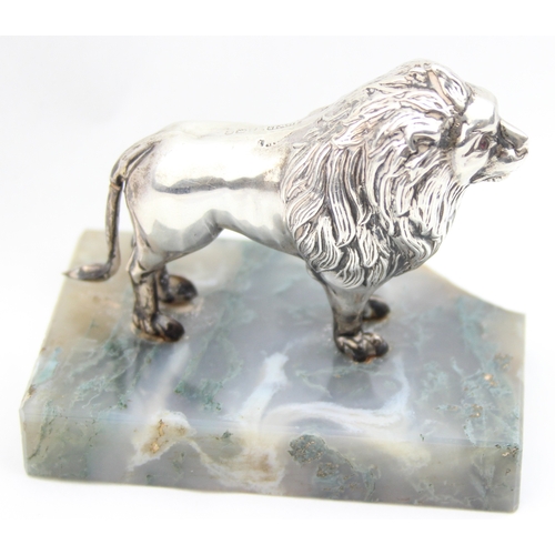 1099D - An unusual Edwardian silver model of a lion on stone base, marked for Birmingham 1908 by Henry Willi... 