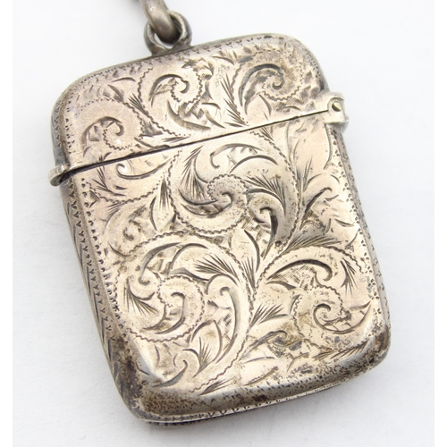 1099N - An antique silver vesta case with engraved decoration, Birmingham 1897 on an unmarked silver but XRF... 