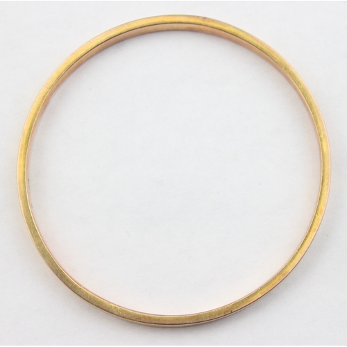 1100 - A 9ct gold plain band bangle, Birmingham 1971, approx 75mm in diameter, approx 9.02g gross