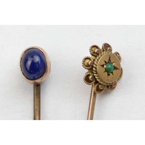 1102 - 2 antique 9ct gold mounted stick pins, one with a blue cabochon stone, the other set with turquoise ... 