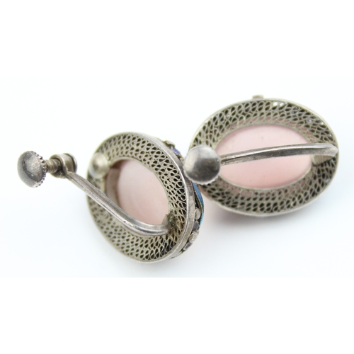 1108 - A pair of vintage silver filigree and cloisonne enamel clip on earrings set with a large cabochon st... 