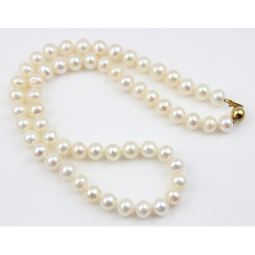 1126 - A vintage pearl necklace with 9ct gold ball clasp, marked 375 and XRF confirmed, approx 45cm long, t... 