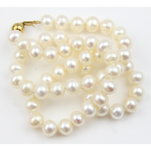 1126 - A vintage pearl necklace with 9ct gold ball clasp, marked 375 and XRF confirmed, approx 45cm long, t... 