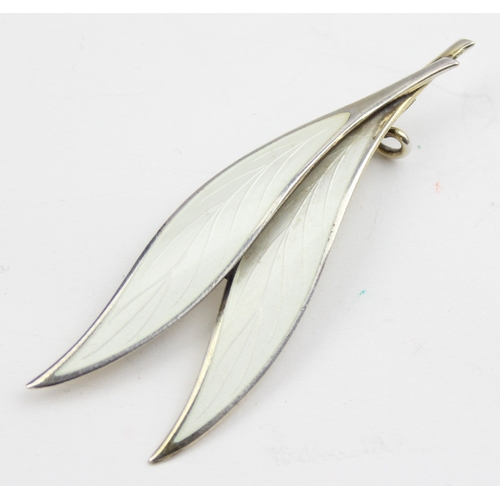 1133 - Thune of Norway, a sterling silver and white enamel double leaf brooch, marked to reverse and XRF co... 