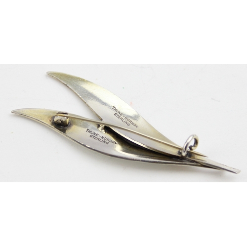 1133 - Thune of Norway, a sterling silver and white enamel double leaf brooch, marked to reverse and XRF co... 