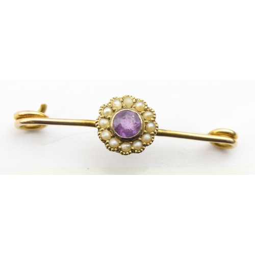 1139 - An antique 9ct gold, seed pearl and amethyst bar brooch, indistinctly marked and XRF confirmed, pres... 